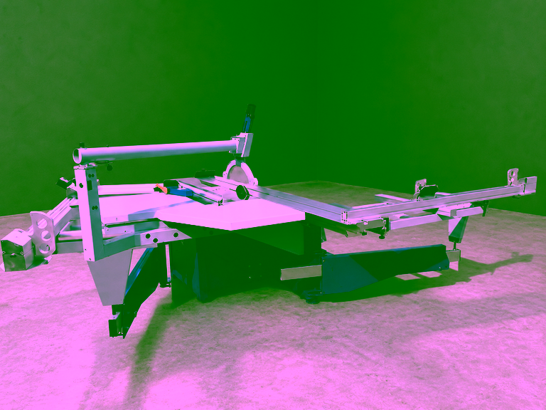 Three-quarter view with the extension frame and the saw blade guard arm