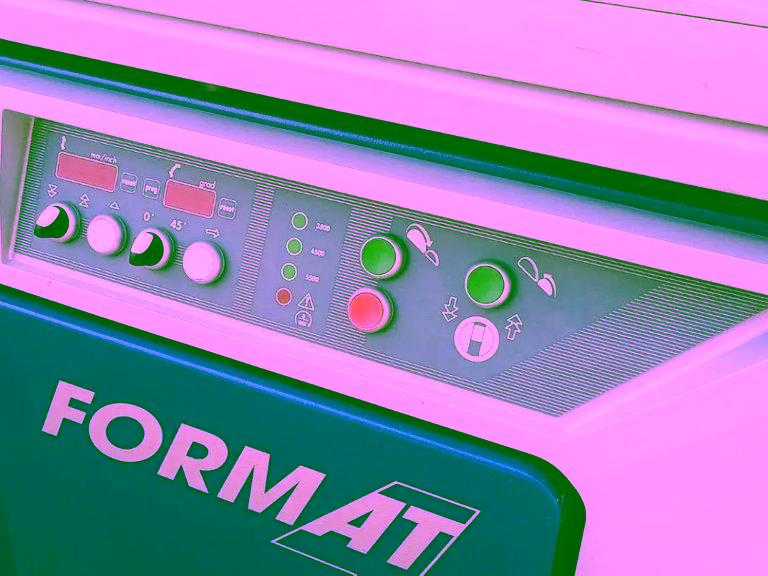 Control panel with digital displays for blade height and tilt angle